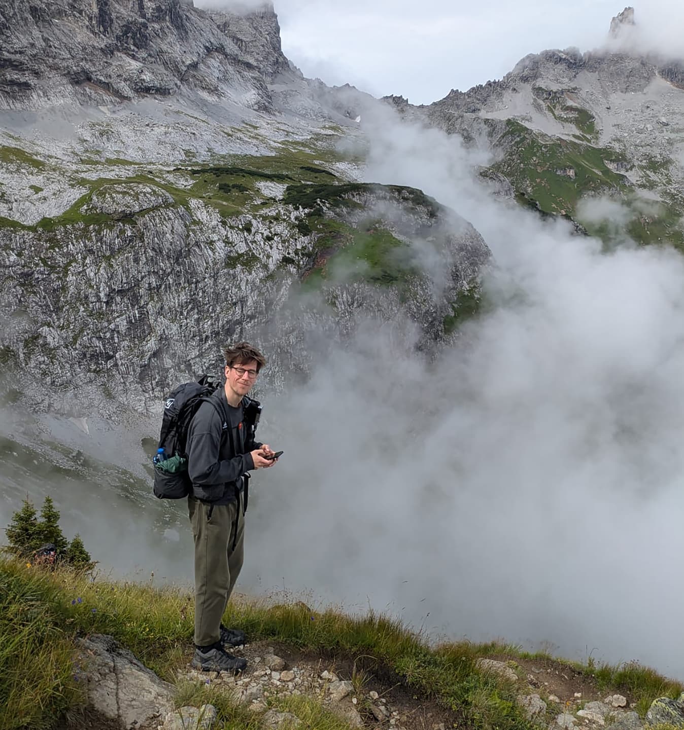 dude navigating on mountain range